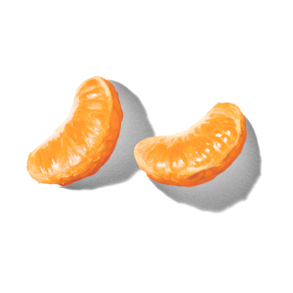 Two clementine slices on an empty background